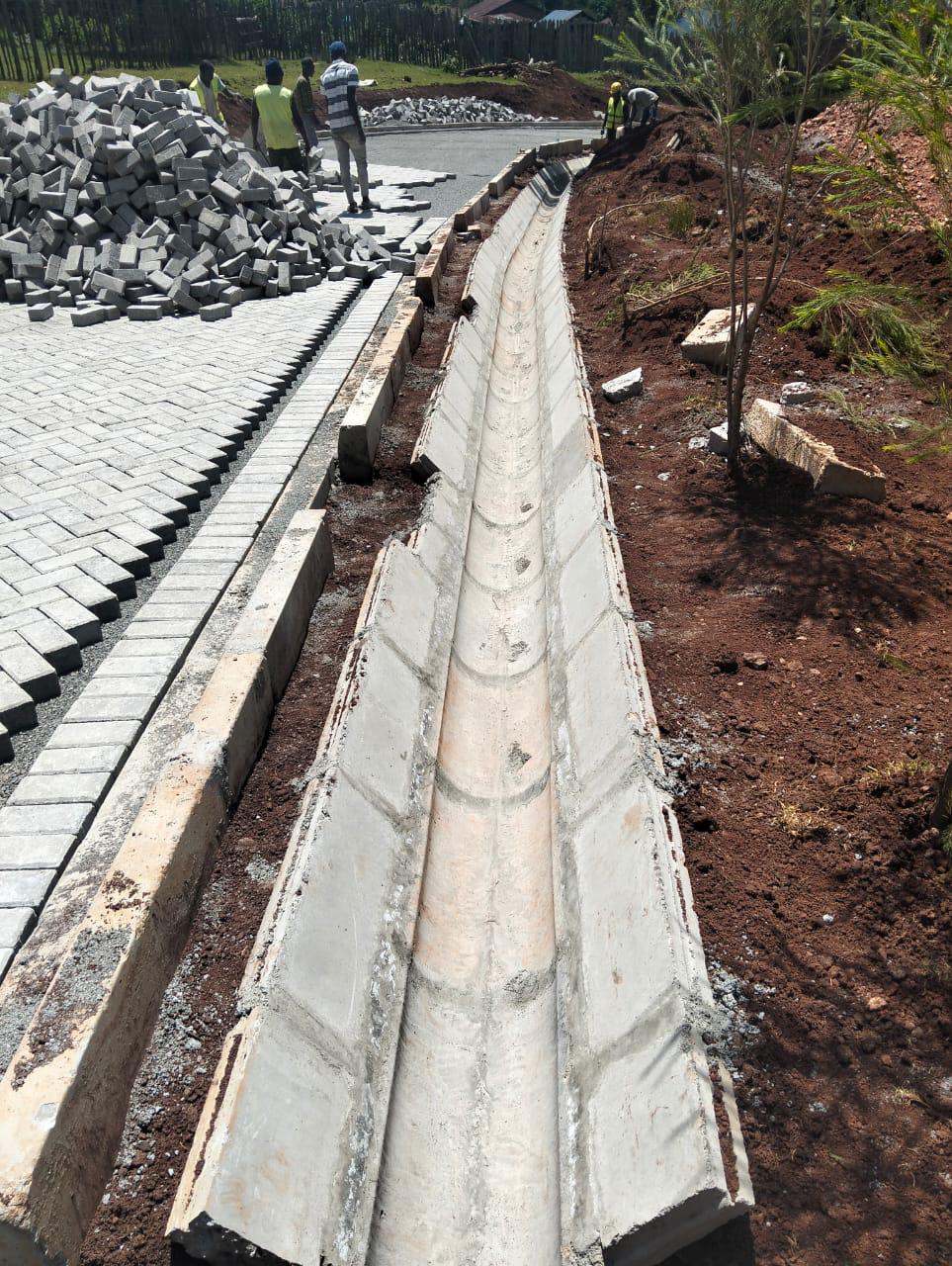 Cabro paving and concrete storm-water channel installation